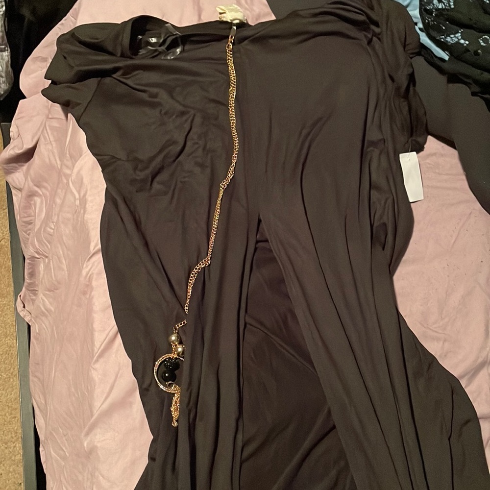 Short sleeve black dress with a split in the front